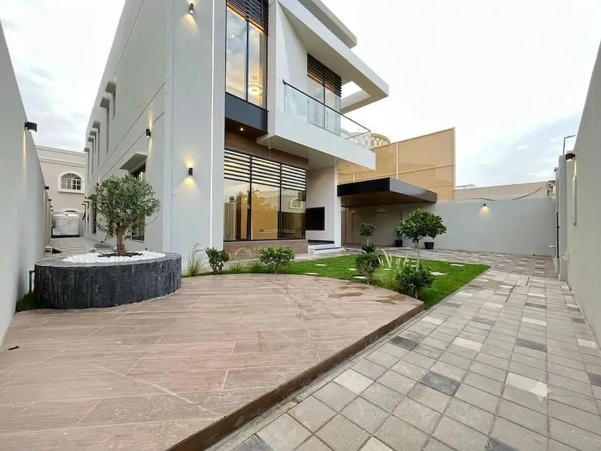 White & Brown-Themed 5-Bedroom Villa
